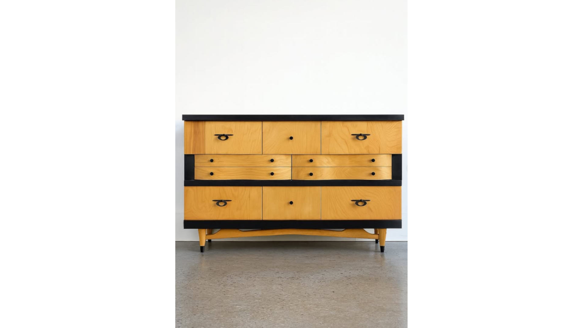 ATOMIC LOW BOY DRESSER Stripped, sanded, stained in natural & painted in black accents to create a gorgeous contrast! Retaining its original atomic hardware that was prepped & refinished in a black matte/finish.