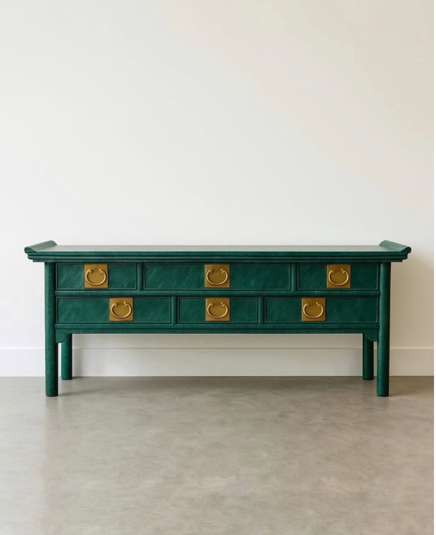 Presenting this RARE and stunning console/sideboard, designed by Raymond Sobata for Century Furniture – Chin Hua Series, circa 1970. Lacquered in a striè finish with jade and emerald tones, it creates depth and subtle movement, accented by solid brass Ming-style hardware. A statement heirloom piece that will beautifully enhance any interior space.
Dimensions:
H - 30”
W - 72”
D - 18”
